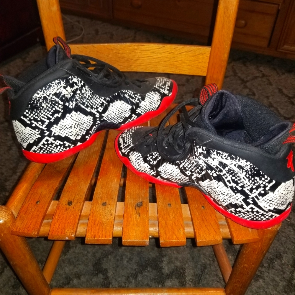 Nike Air Foamposite One Youth tennis shoes.  Snakeskin, black, white, and red.